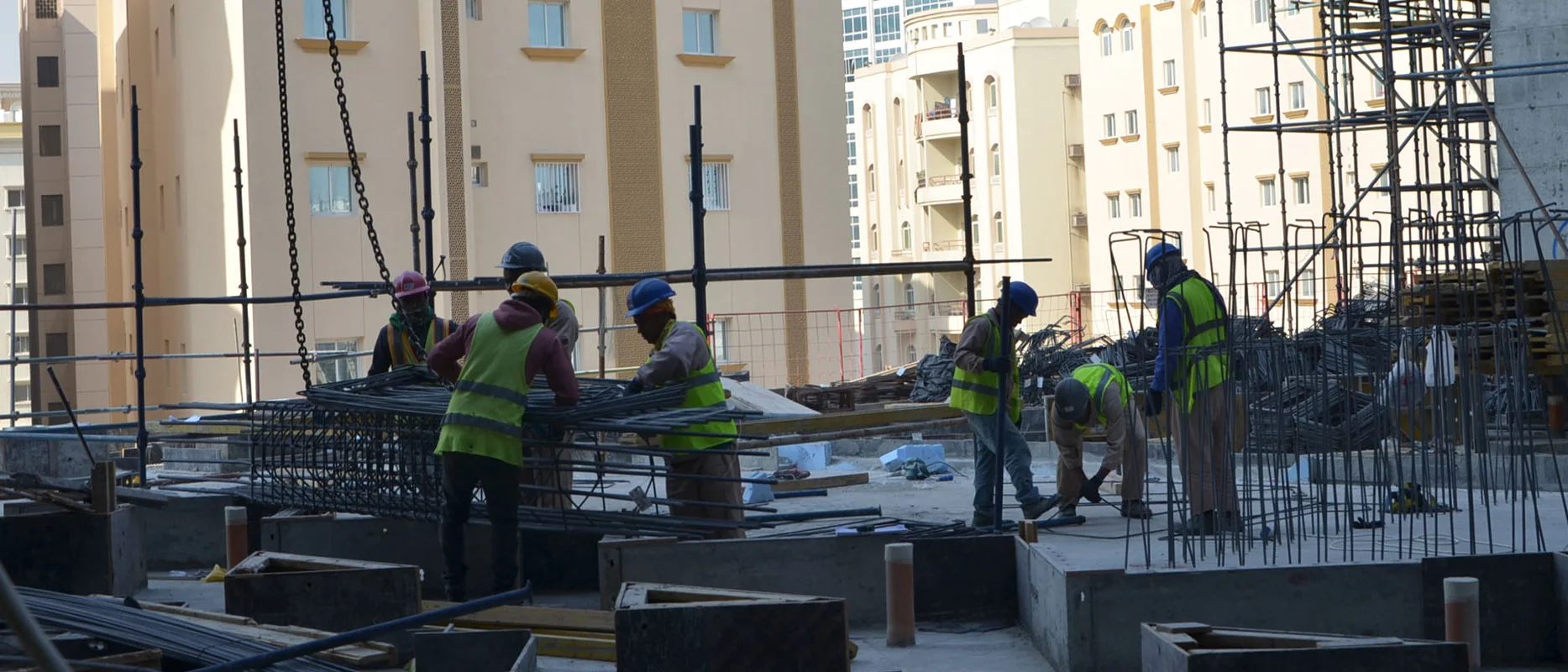Steel fixers working on a reinforcement deck