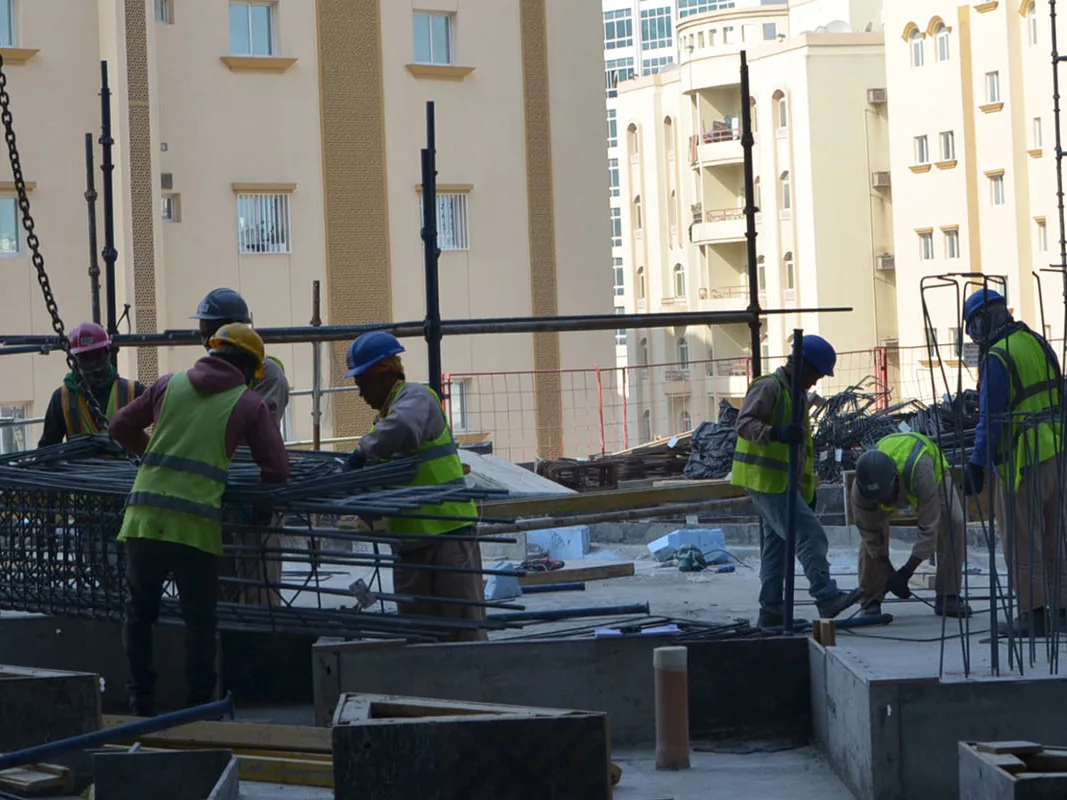 Steel fixers working on a reinforcement deck